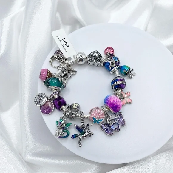 Linx Snake Chain Bracelet with Whimsical Animal Themed Charms